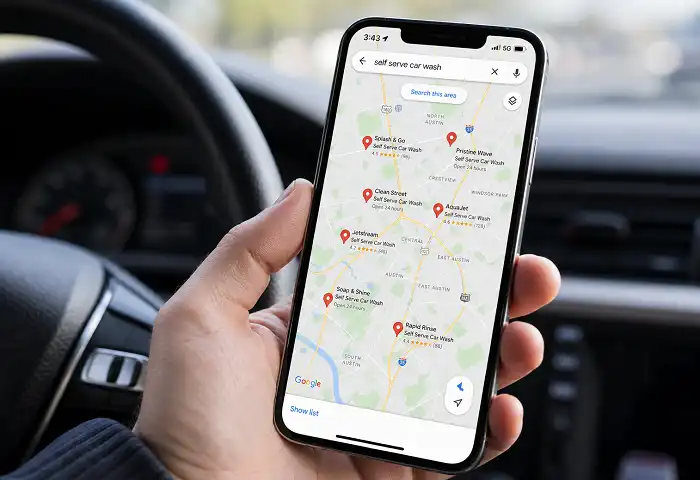 Phone showing self serve car wash search on Google Maps