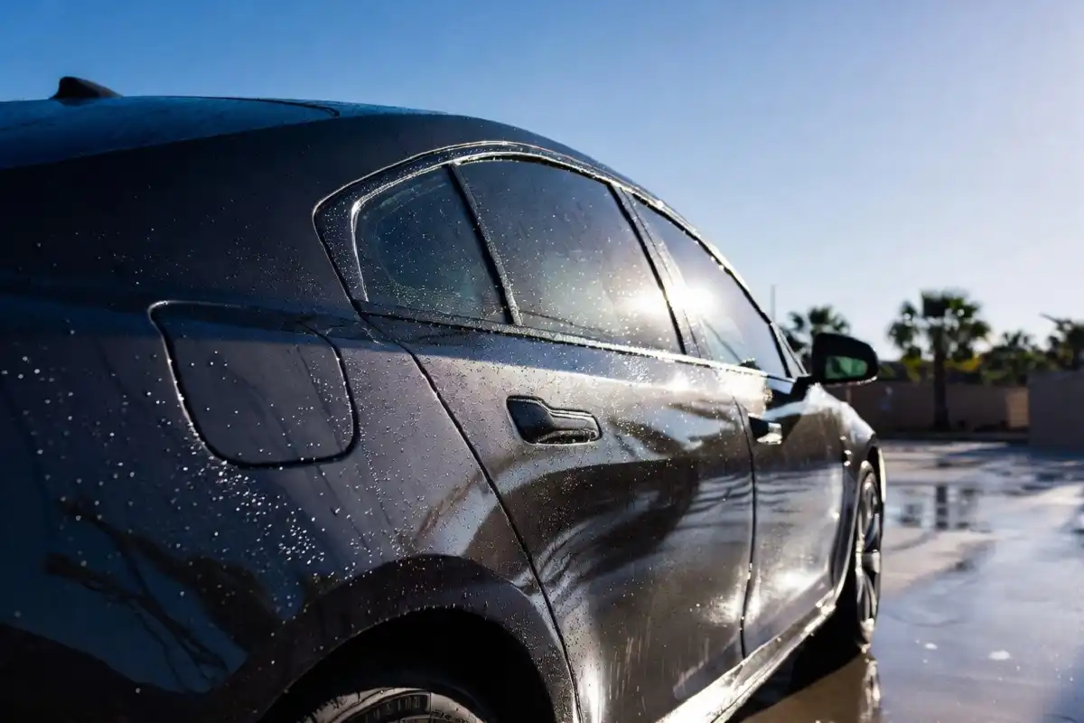 Shiny clean car after professional splash car wash treatment