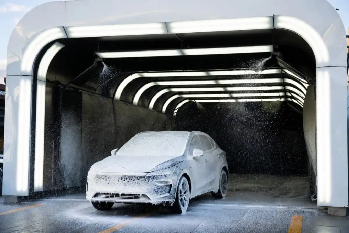 Car entering a Whitewater Express Car Wash tunnel